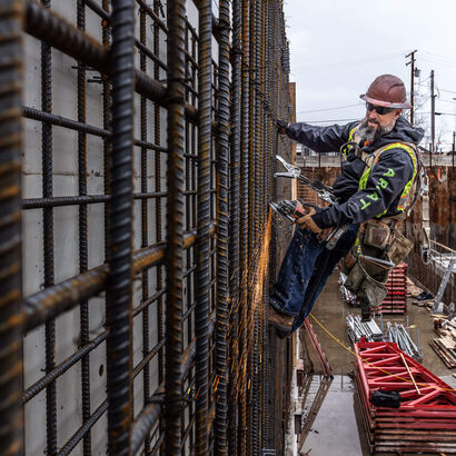 Rebar Stormshell Logo Waterproof Jacket Lifestyle
